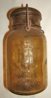 Antique amber glass fruit jar w wire bail lid Anchor Hocking Lightning 