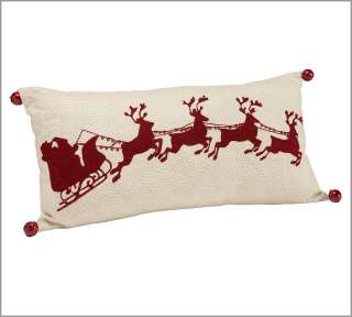   on our pillow. Red sleigh bells jingle at the corners