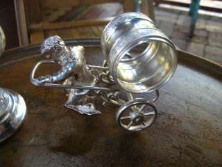 antique American silver/silverplate figural napkin ring boy wheels 