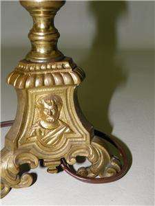 We are pleased to be offering this amazing figural brass candlestick 