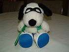   FEATURE SYNDICATE PEANUTS SNOOPY WITH SNOOPY SURF BOARD AT THE BEACH