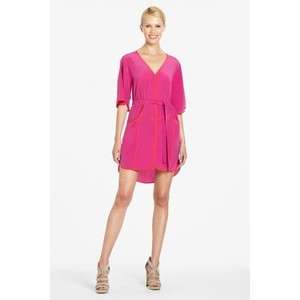 With an easy fluid silhouette, this silk crepe de chine kimono dress 