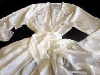 The robe is new old stock and in excellent condition, with crisp 