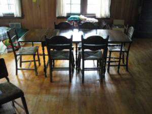 ANTIQUE CHERRY DROP LEAF TABLE AND 6 CANE CHAIRS  