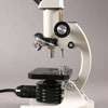 Compound light microscope for use with viewing biological specimens on 