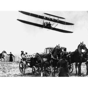 Wilbur Wright with His Plane in Flight at Pau in France, February 1909 