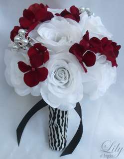   above are made with one white rosebud accented with red hydrangeas