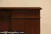 About 30 years old, a classic walnut executive desk has two pull out 
