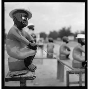   American man,fishing pole,ethnic stereotypes,1951